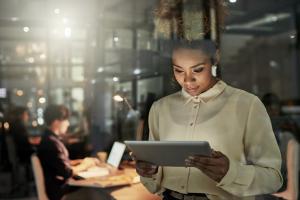 Business woman holding a tablet
