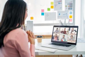 Woman having video conference on laptop
