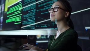 Woman looking at screen with text