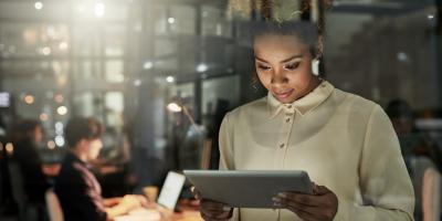 Business woman holding a tablet