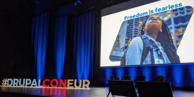 Color photo of empty stage at DrupalCon Lille