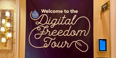 Color photo of Digital Freedom Tour banner at Engage Boston 2023