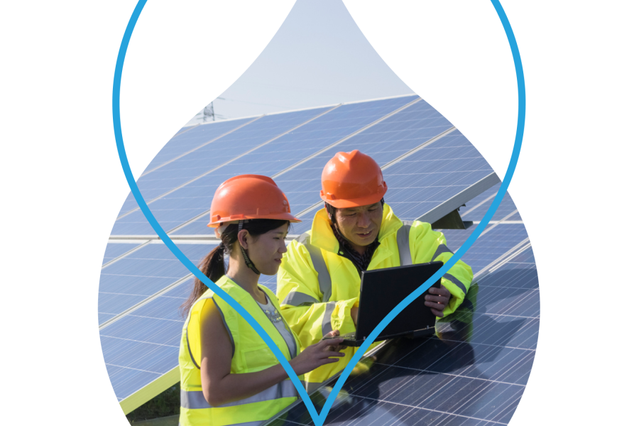 Image of 2 people working on solar panels in a cropped region of the Acquia Droplet