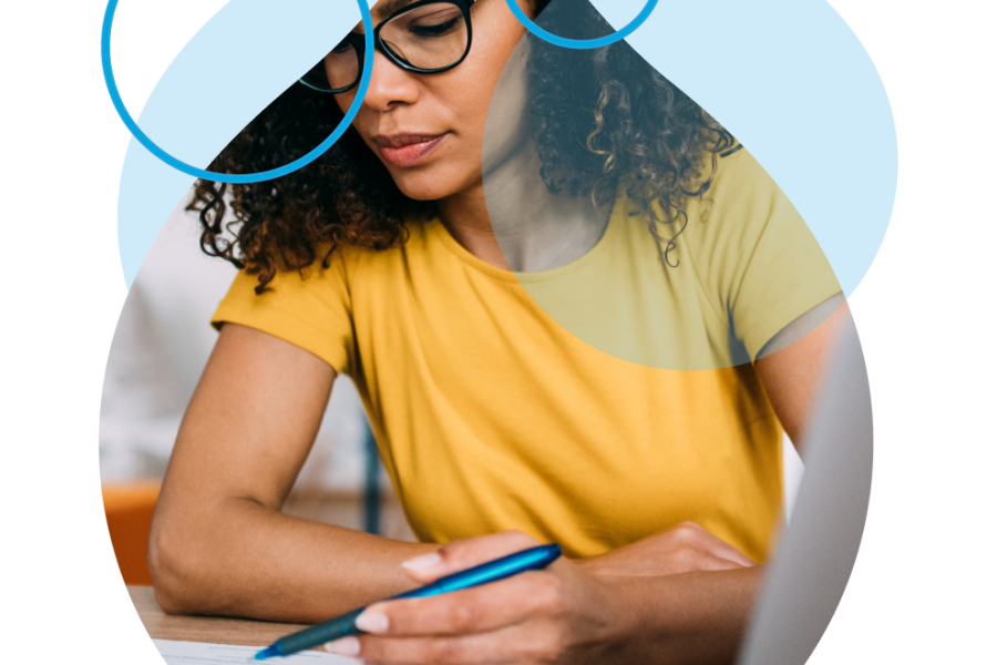 woman looking over a list masked in an acquia droplet