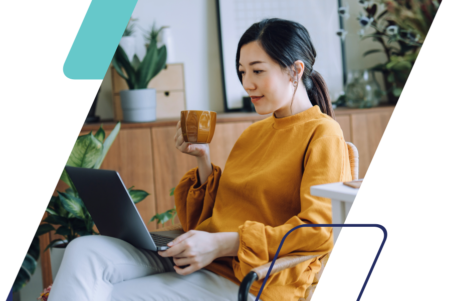 Image of a person on a laptop masked by a parallelogram