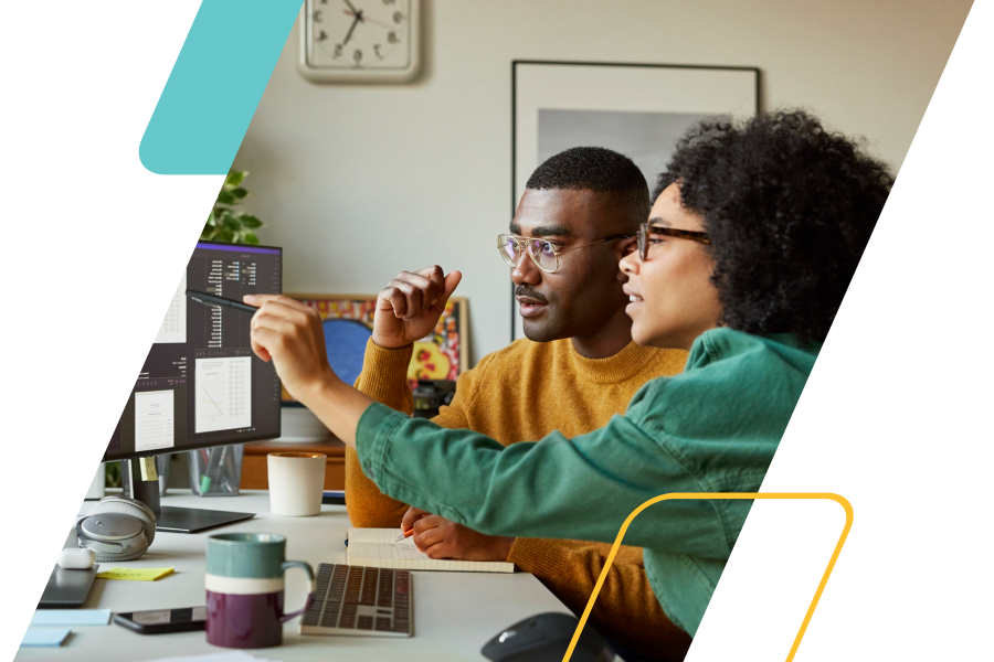 yellow and teal parallelograms  with an image of a woman sitting next to a man pointing at a computer