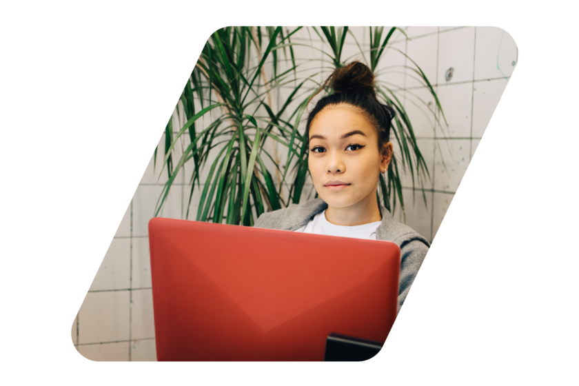 Developer Workflow Tools Header Image woman with orange laptop
