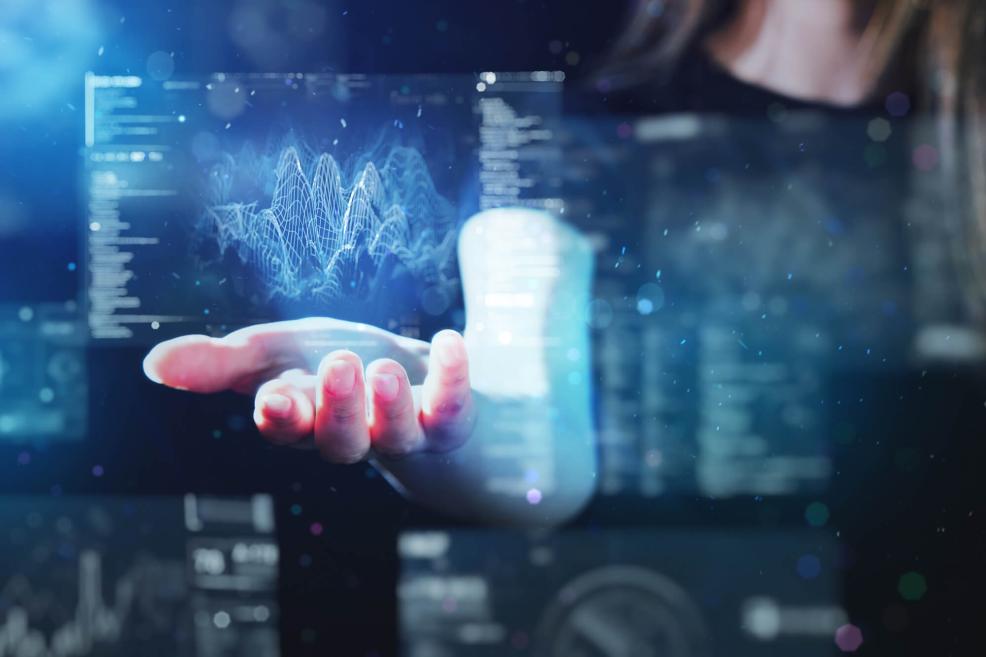 Hand with holographic data projections