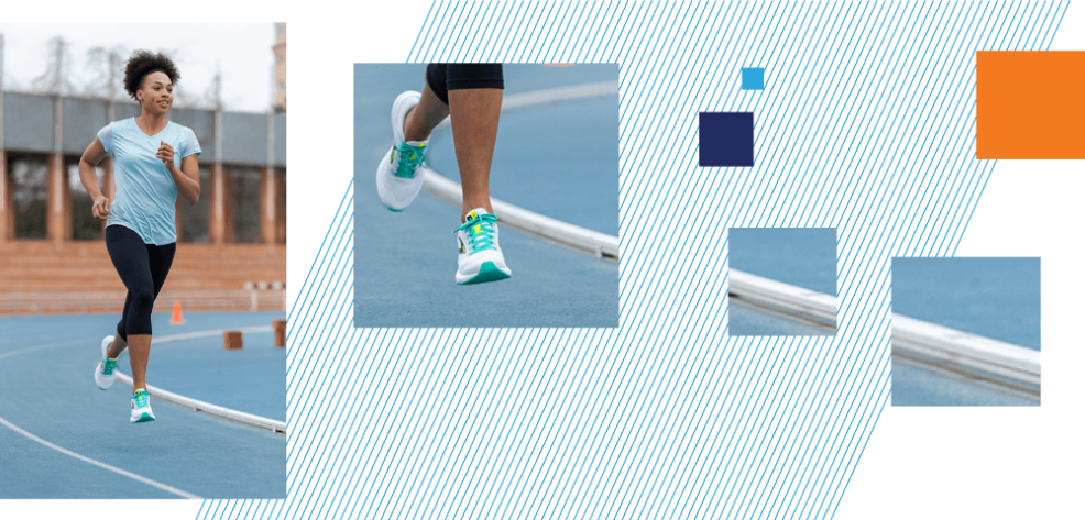 Woman running on track with close up of her sneakers