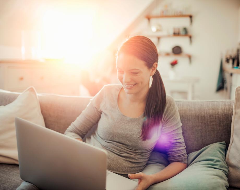 woman at laptop writing