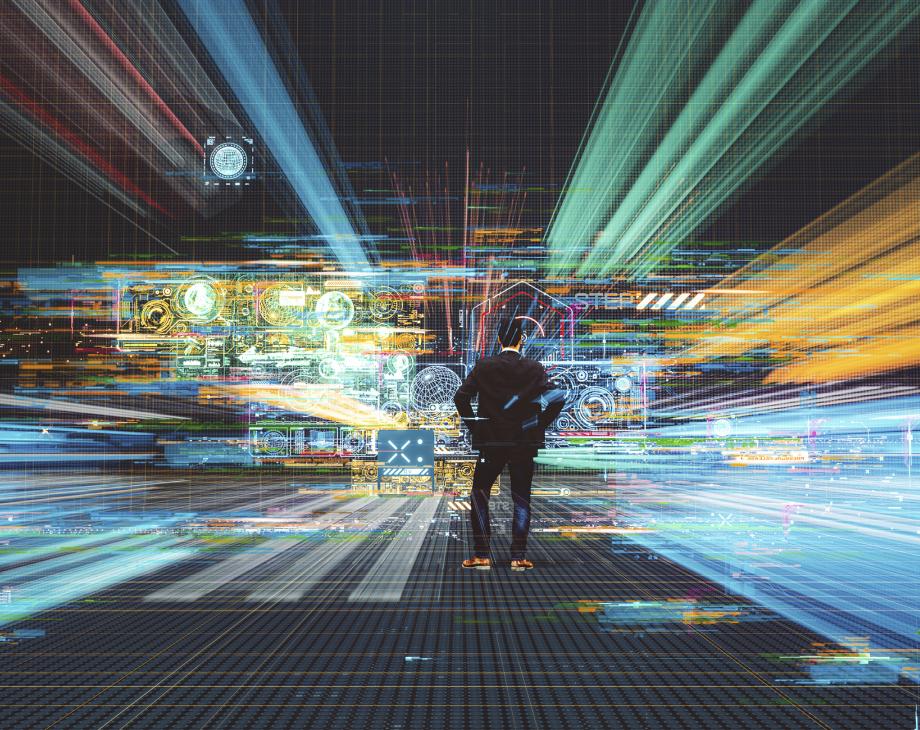 Man surrounded by digital technologies