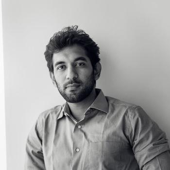 Black-and-white photo of Pratik Patki in oxford shirt