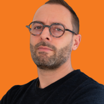 Robin Thomas Headshot Orange