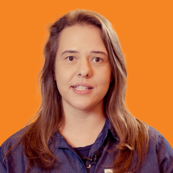 Jessica Renesto Headshot on an Orange Background
