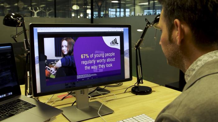 Still shot of someone speaking from the YMCA Case study video