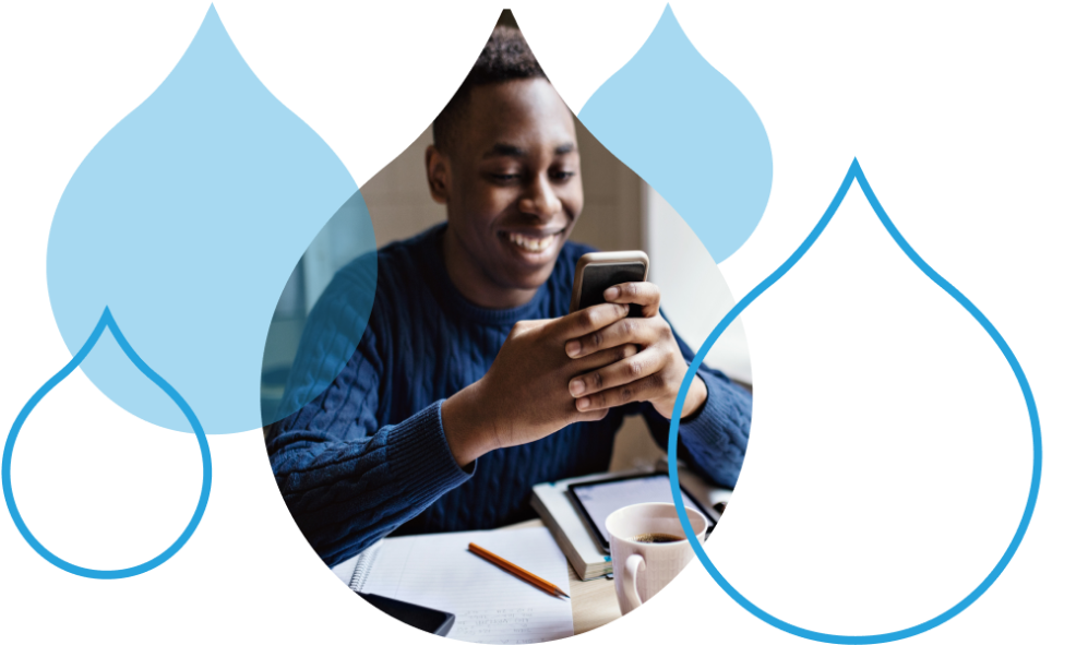 Person on phone surrounded by acquia droplets