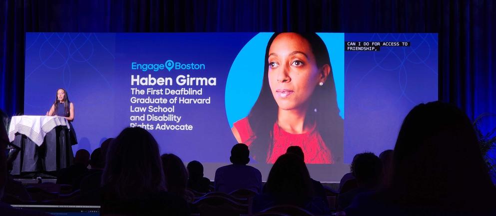 Color photo of Haben Girma giving a keynote at Engage Boston 2023
